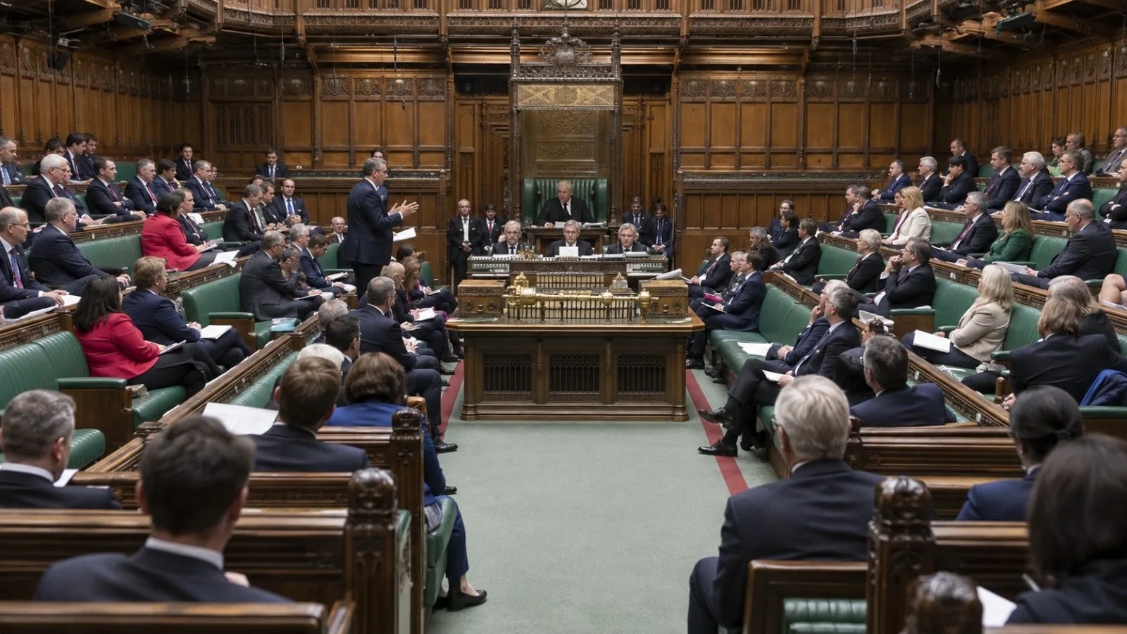 Lawmakers sit in the House of Commons at the Palace of Westminster in London. (AI-generated image / EconoTimes)