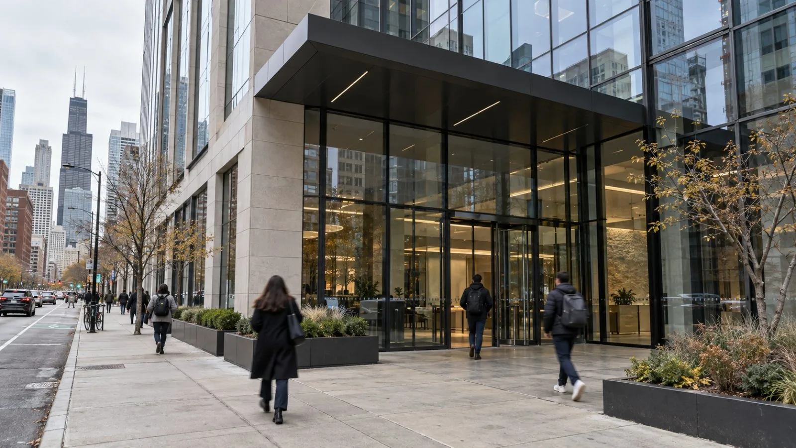 Pedestrians walk past the glass office building at 600 West Chicago Avenue in Chicago. (AI-generated image / EconoTimes)