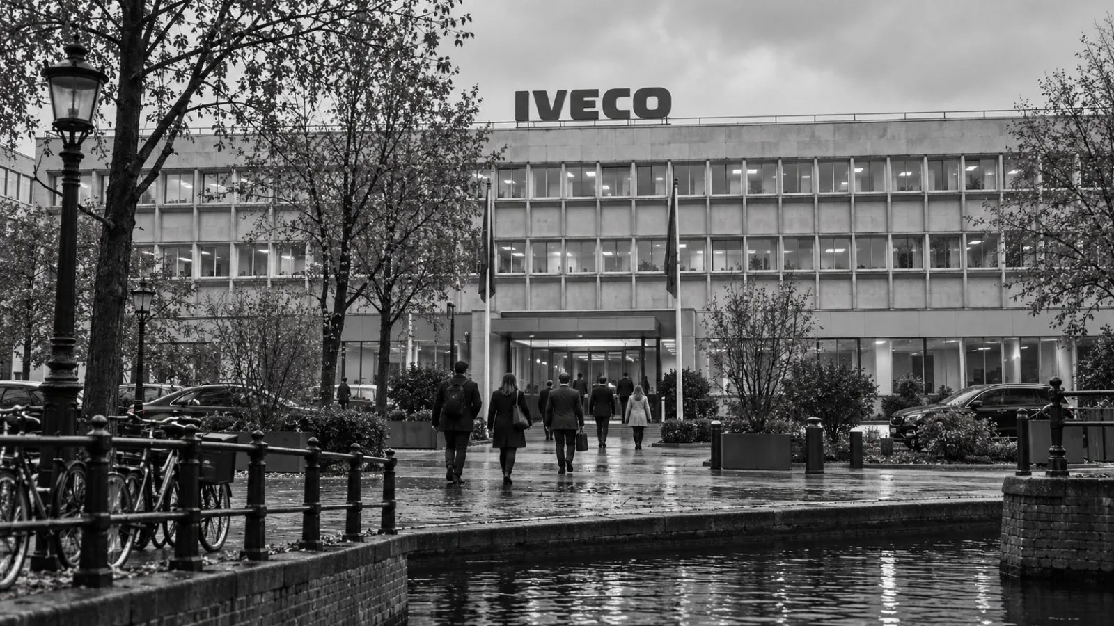 Attendees enter a conference venue under overcast skies in Amsterdam. / EconoTimes.ai