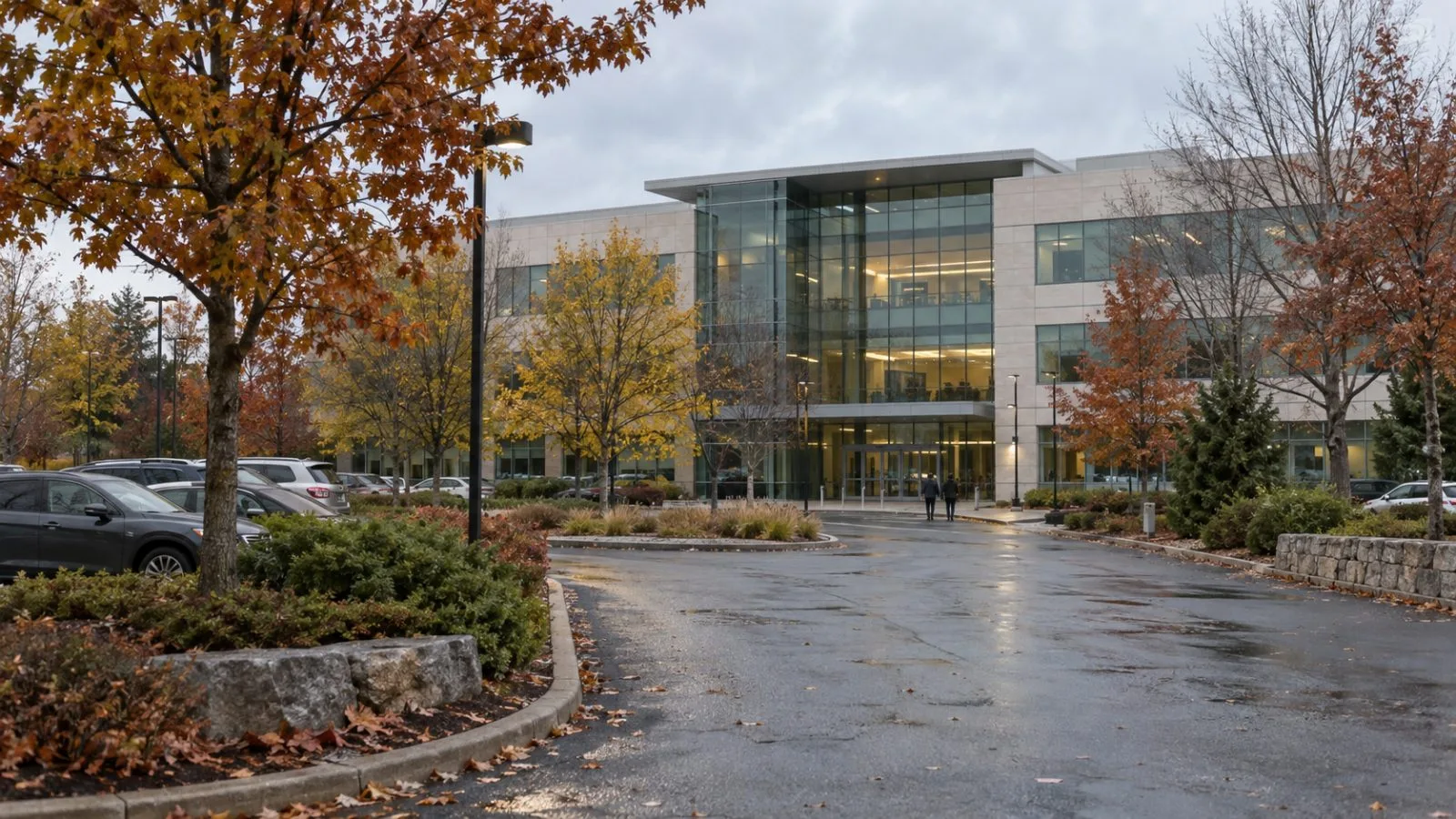 The headquarters building stands on One Vision Drive in Natick, Massachusetts. (AI-generated image / EconoTimes)