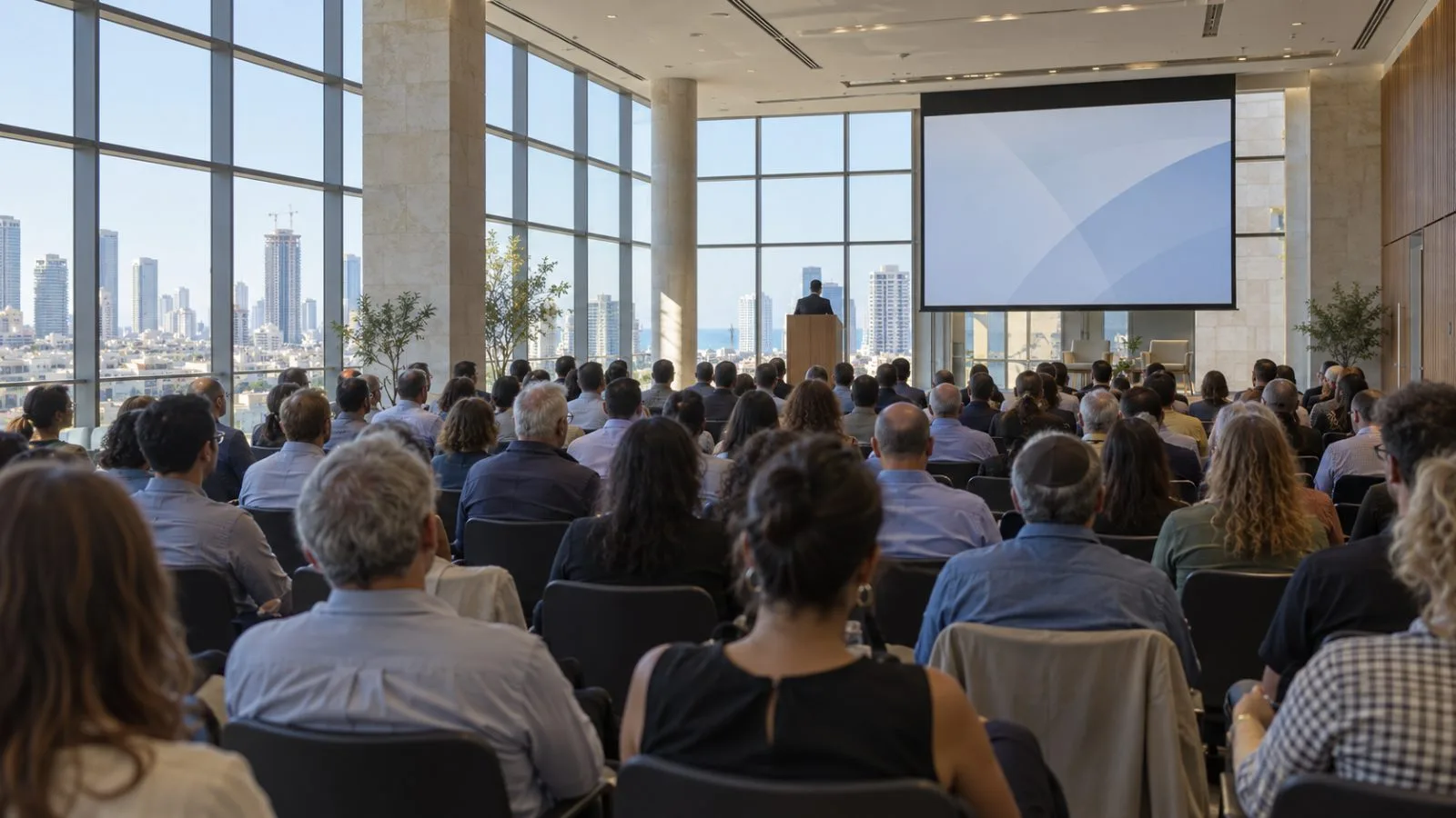 Attendees listen during a technology summit in Tel Aviv, Israel. (AI-generated image / EconoTimes)