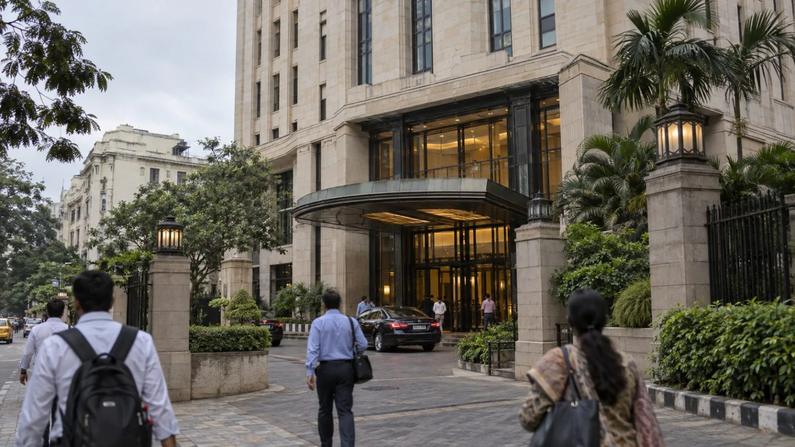 Pedestrians pass Virginia House, ITC Limited’s headquarters, in Kolkata, India. (AI-generated image / EconoTimes)