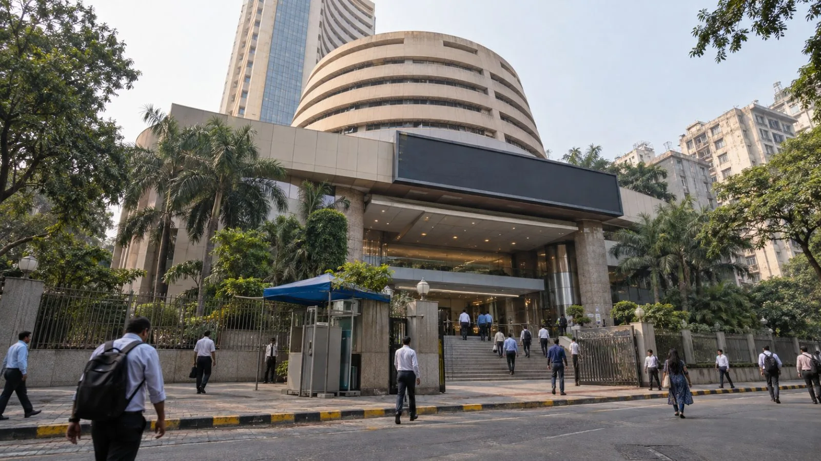 Pedestrians pass the Bombay Stock Exchange in Mumbai on a hazy afternoon. (AI-generated image / EconoTimes)