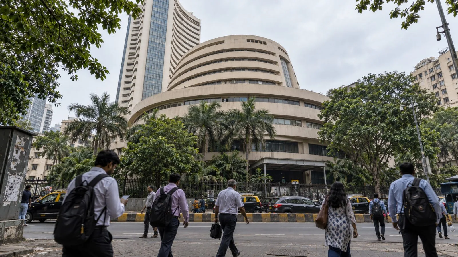 Pedestrians cross Dalal Street outside the Bombay Stock Exchange in Mumbai, India. (AI-generated image / EconoTimes)