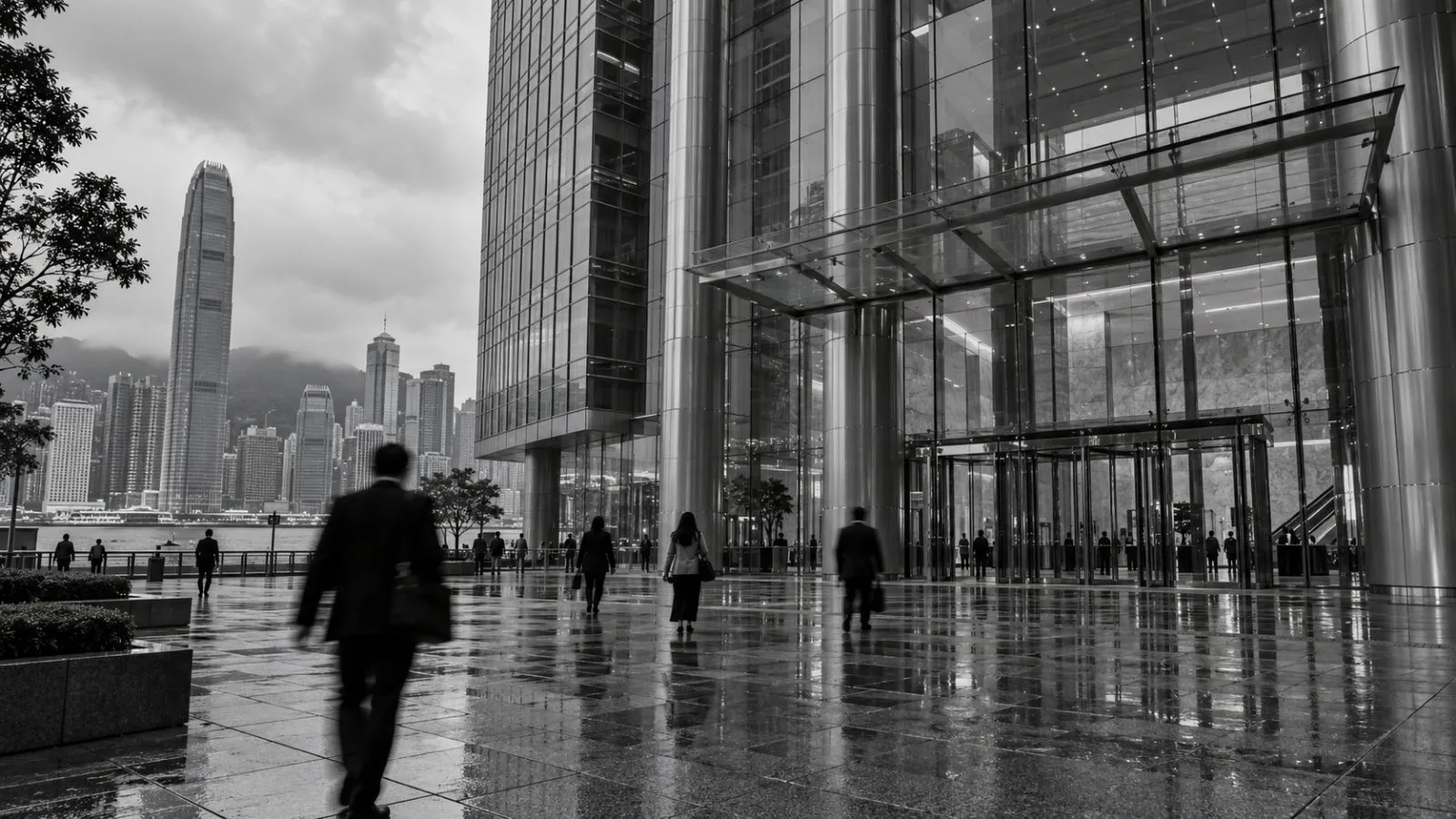 Pedestrians pass the Hong Kong Monetary Authority headquarters in Central, Hong Kong. (AI-generated image / EconoTimes)