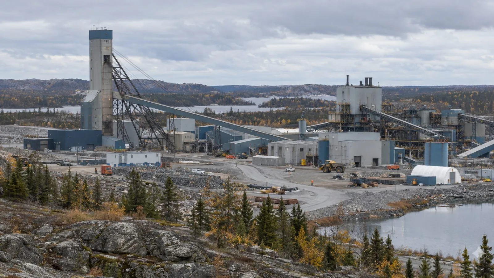 The Thompson mine complex's headframe and concentrator stand near Thompson, Manitoba. (AI-generated image / EconoTimes)