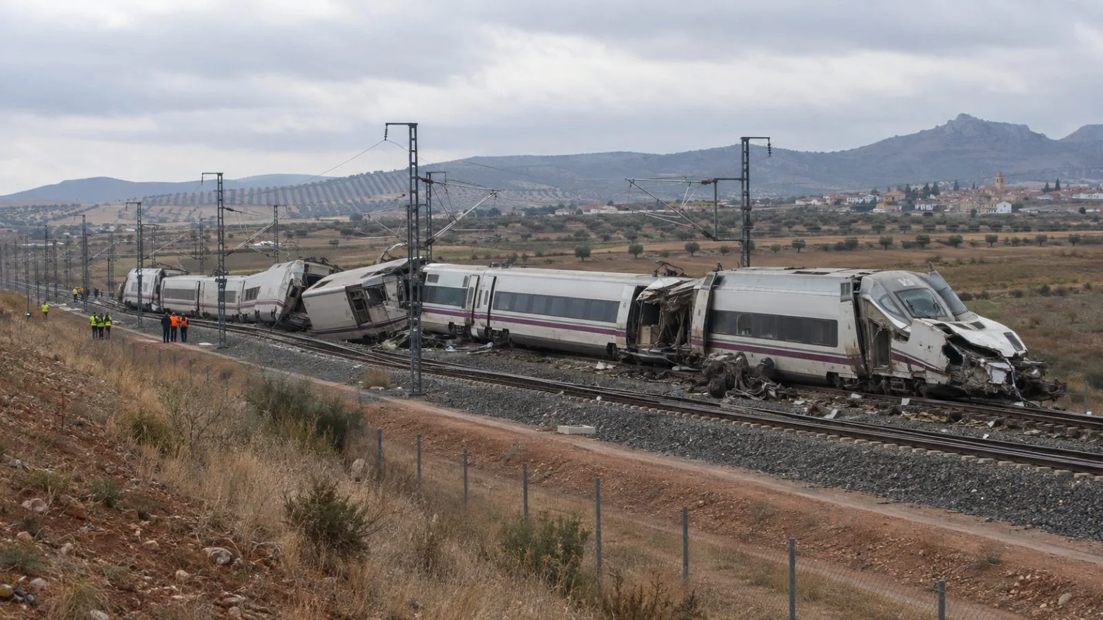 High-speed train cars stand at the collision site between Los Yébenes and Urda, Toledo province (AI-generated image / EconoTimes)