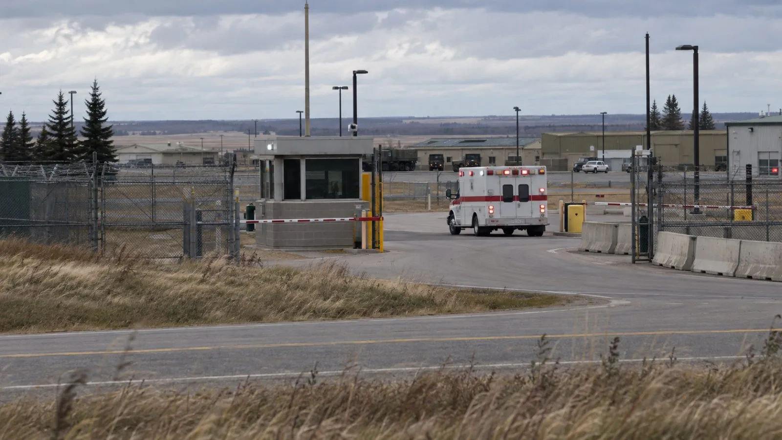 An ambulance enters CFB Wainwright near Wainwright, Alberta, Canada. (AI-generated image / EconoTimes)