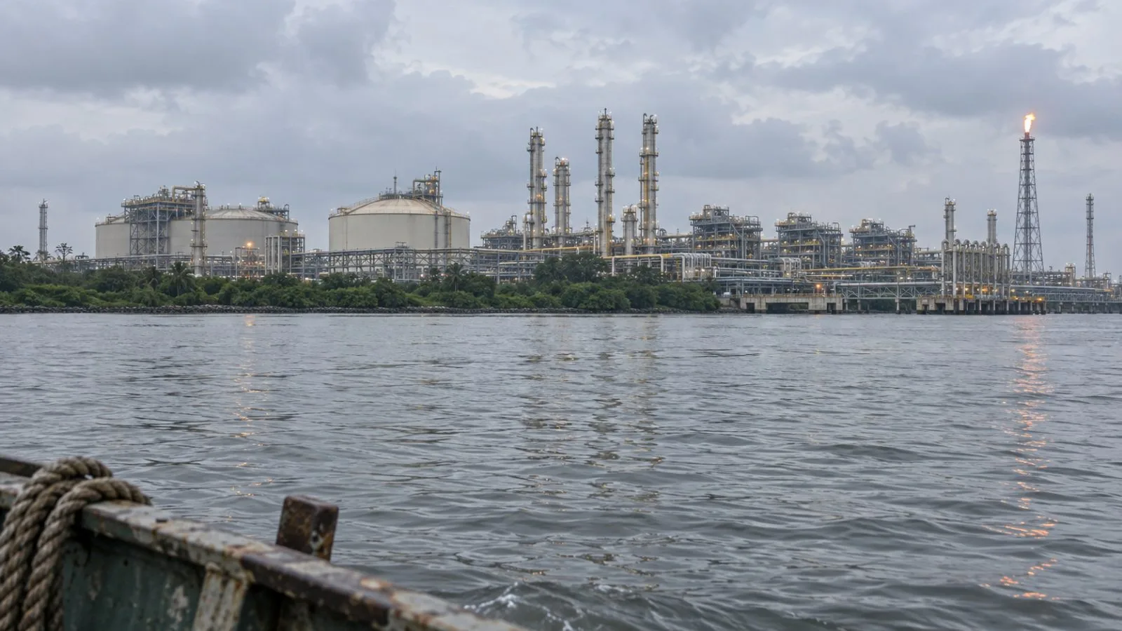 Gas processing facilities line the coast of Bonny Island in Rivers State, Nigeria. (AI-generated image / EconoTimes)