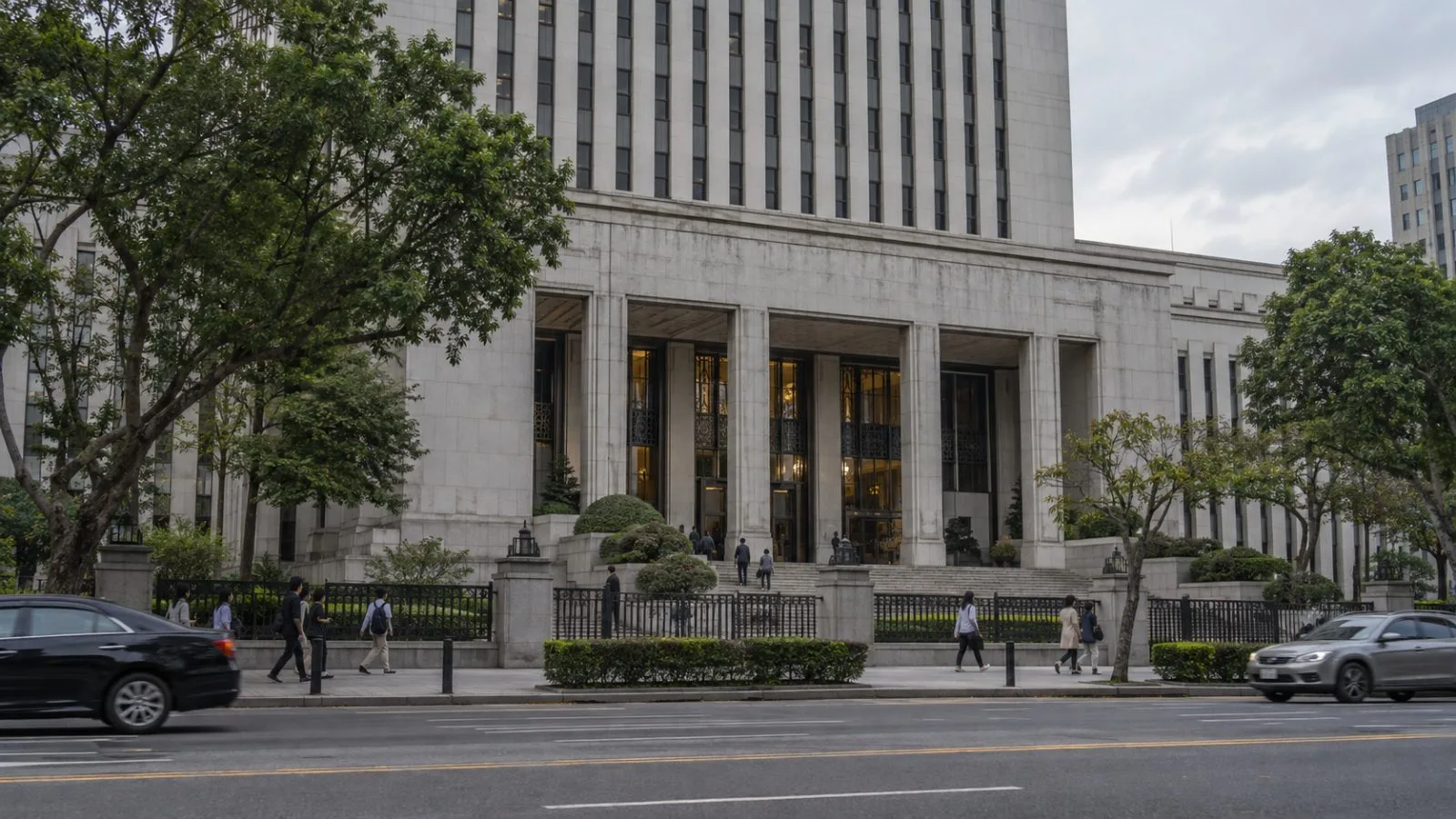 Pedestrians pass the central bank building in Taipei under overcast afternoon light. (AI-generated image / EconoTimes)