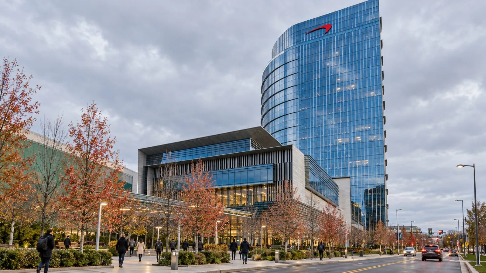 Workers enter Capital One's headquarters in McLean, Virginia, under overcast skies. / EconoTimes.ai
