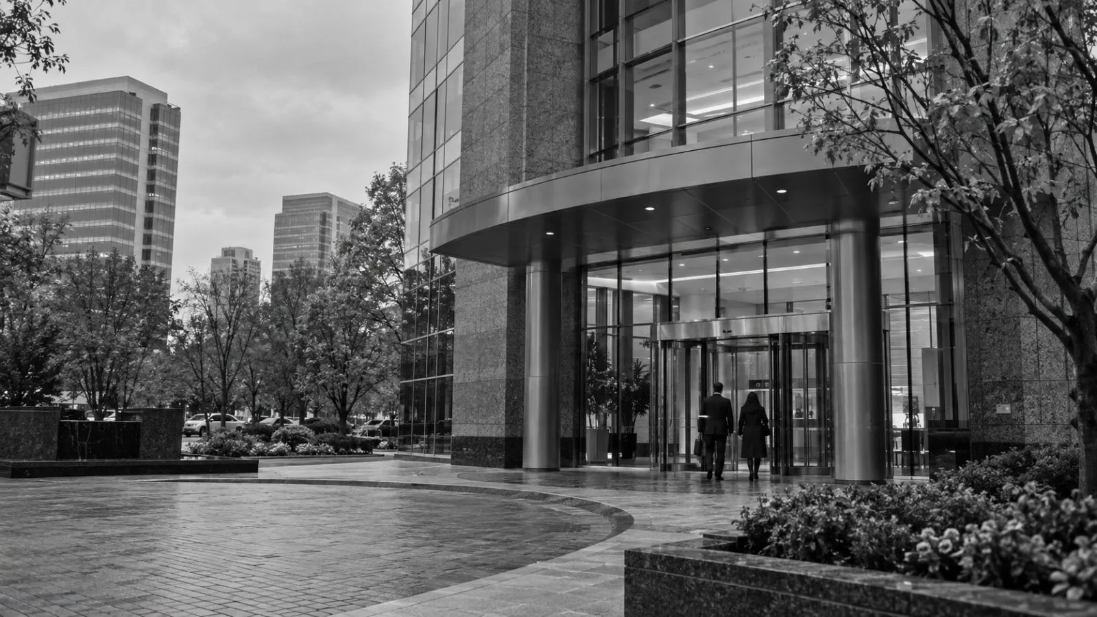 Office workers enter Strategy’s headquarters at Towers Crescent in Tysons Corner, Virginia. (AI-generated image / EconoTimes)