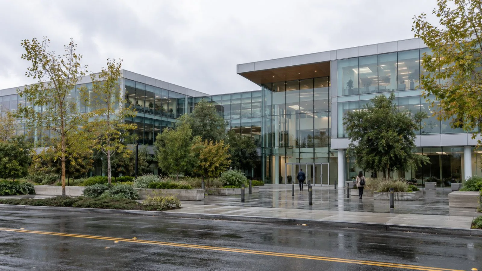 The glass headquarters building stands along Davis Drive in Belmont, California. (AI-generated image / EconoTimes)