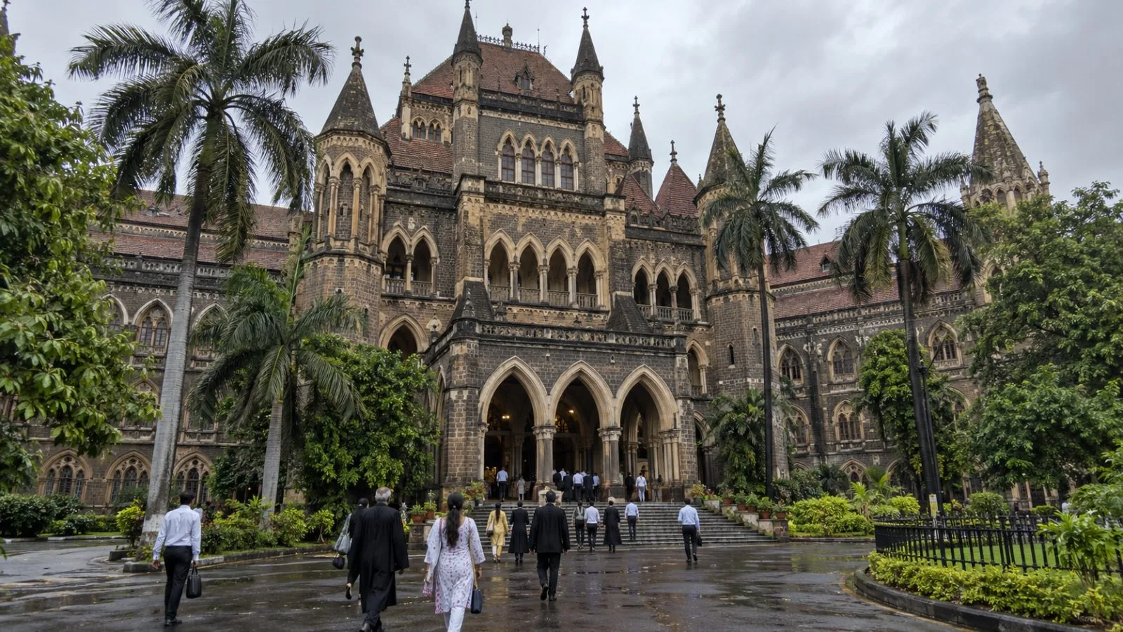 Customers enter the Bank of Baroda head office in Vadodara, India, on a clear morning. / EconoTimes.ai