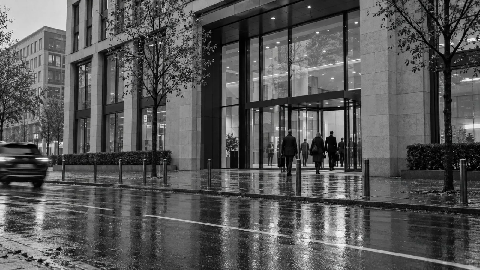 Employees enter an office building in Cologne, Germany, on an overcast morning (AI-generated image / EconoTimes)