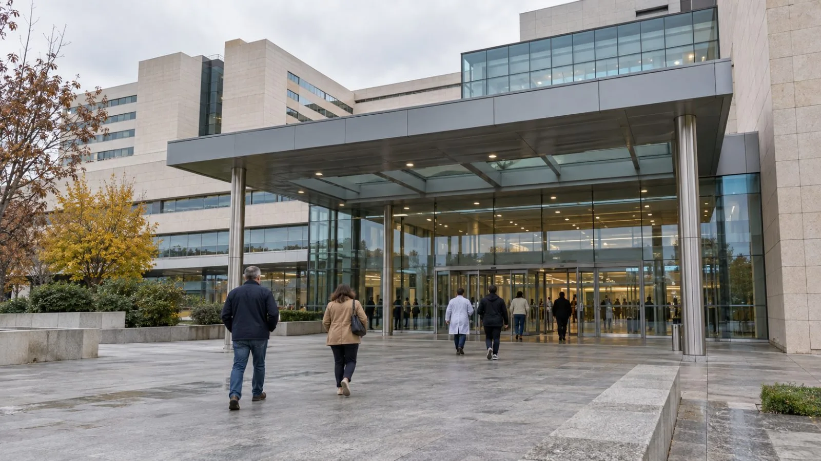 People enter the University Hospital of Toledo in Toledo, Spain. (AI-generated image / EconoTimes)