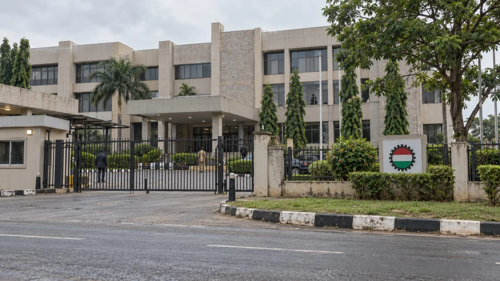 The Federal Ministry of Labour and Employment building stands behind a security gate in Abuja, Nigeria. / EconoTimes.ai