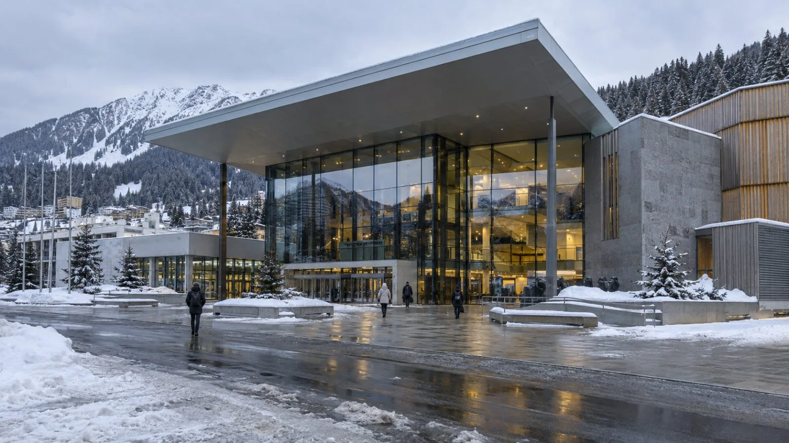 Pedestrians cross outside the Congress Centre in Davos, Switzerland, beneath a gray autumn sky. (AI-generated image / EconoTimes)