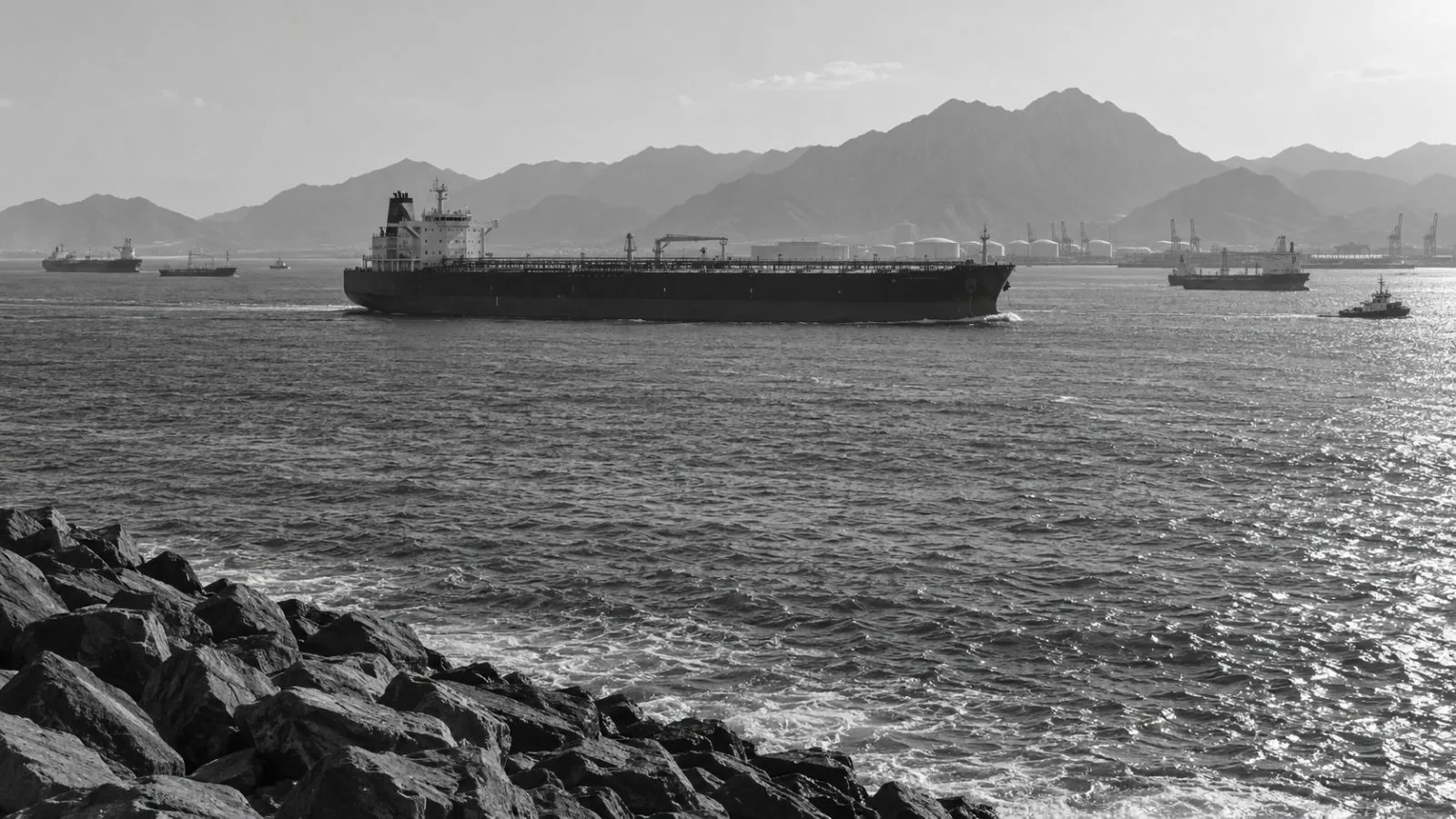 An oil tanker moves through the Gulf of Oman anchorage off Fujairah, United Arab Emirates. (AI-generated image / EconoTimes)