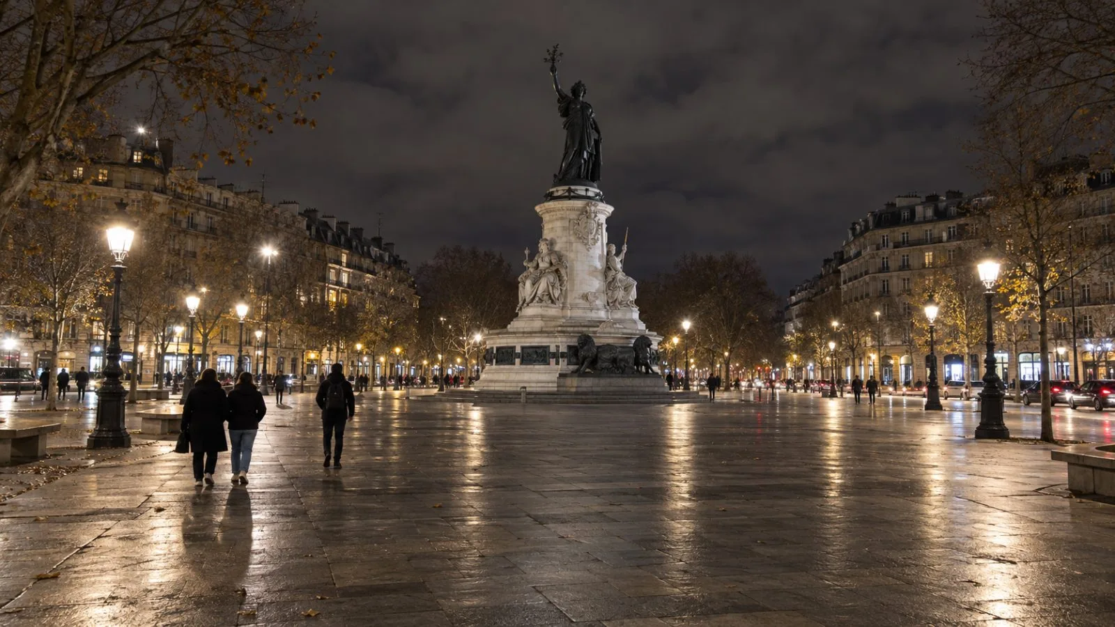 Pedestrians pass the central median of Place de la République in Paris at night. (AI-generated image / EconoTimes)